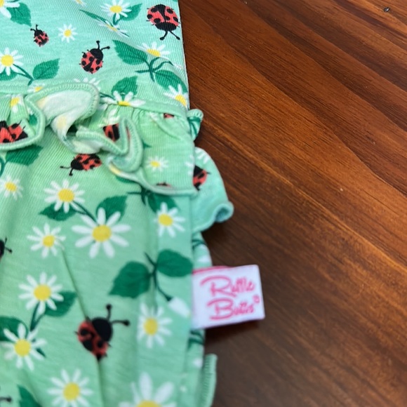 RUFFLE BUTTS Infant Girl Rufflebutts Daisies & Ladybugs Ruffle Detail Romper - Picture 14 of 15